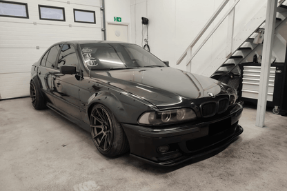 BMW 5-Series E39 sedan full over fender kit by K2 Industries, showing the set of wide over fenders for 1996-2003 models.