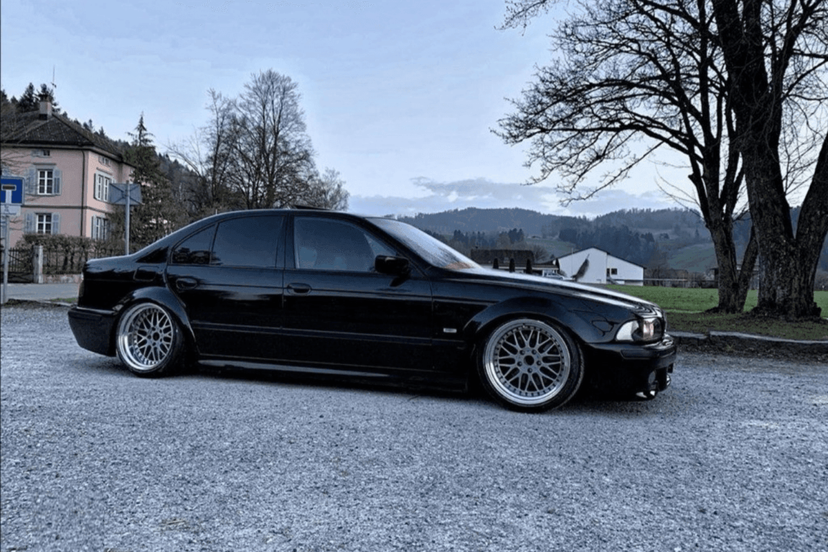 BMW 5-Series E39 sedan full over fender kit by K2 Industries, featuring wide fender flares for a custom look.
