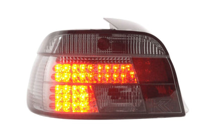 BMW 5-series E39 sedan smoked LED taillights set by K2 Industries, featuring sleek black lens design for 1995-2000 models.