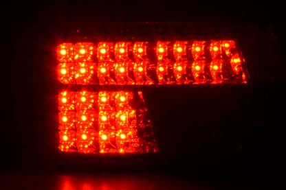 BMW 5-series E39 sedan smoked LED taillights set by K2 Industries, for 1995-2000, showing sleek, smoked lens design.