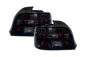 BMW 5 Series E39 smoked tail lights by K2 Industries, showing the darkened lens design for 1995-2000 model years.