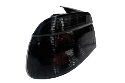 BMW 5 Series E39 smoked tail lights by K2 Industries, showing the dark-tinted rear light assembly for 1995-2000 models.