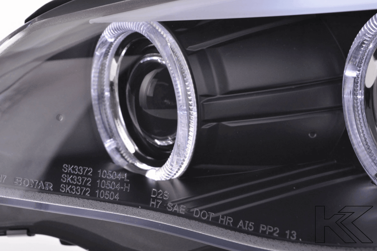 BMW 5-series E60 E61 black angel eyes headlights set by K2 Industries, for 2003-2007 models, showing front view with angel eye rings