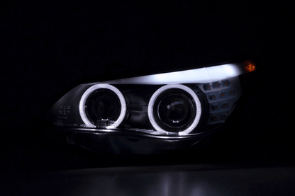 BMW 5-series E60 E61 black angel eyes headlights set by K2 Industries, 2003-2007, showing front view with clear lenses.