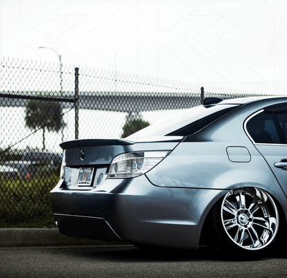 BMW 5 Series E60 sedan chrome clear LED taillights set by K2 Industries, for 2004-2007 model with sleek lighting design