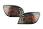 BMW 5 Series E60 sedan chrome smoked LED taillights by K2 Industries, showcasing sleek design and clear lighting details.