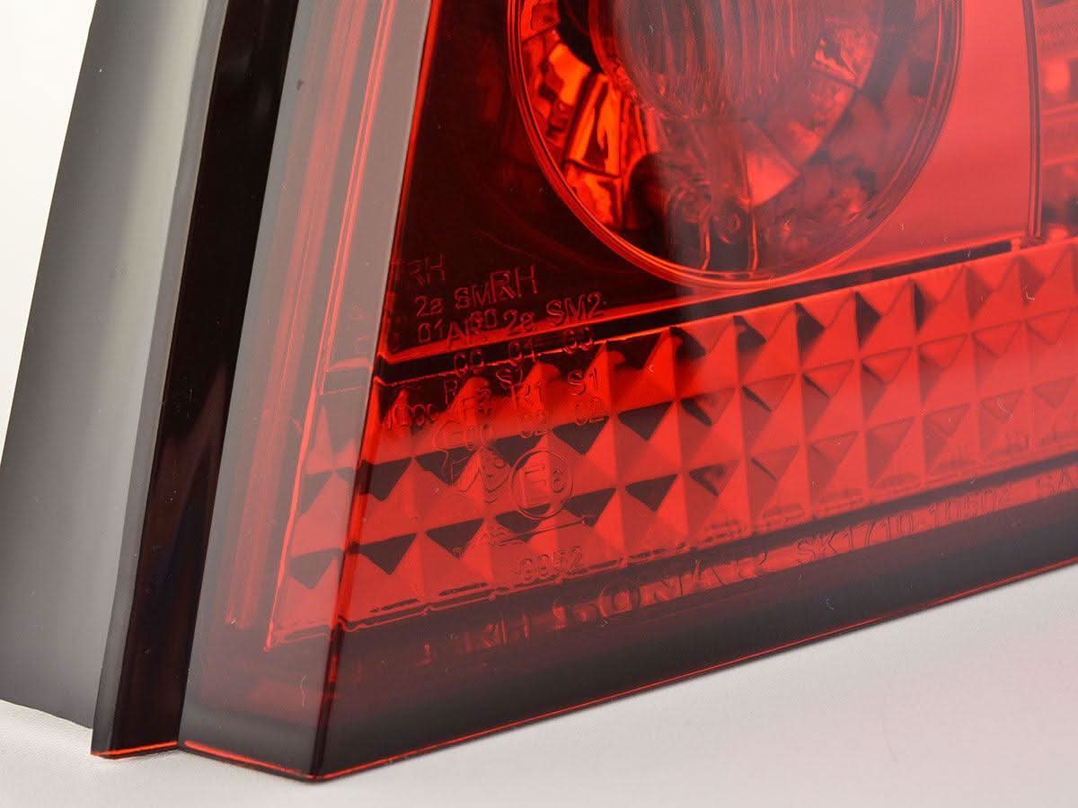 BMW 5-series E60 sedan red smoked LED tail lights set by K2 Industries, for 2008-2009 model with sleek smoked design.