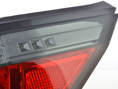 BMW 5-series E60 sedan red smoked LED tail lights set by K2 Industries, for 2008-2009 model year, showing the taillight design.
