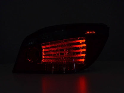 BMW 5-Series E60 sedan red and smoke LED tail lights by K2 Industries, 2007-2009 model, close-up view of the taillight assembly.