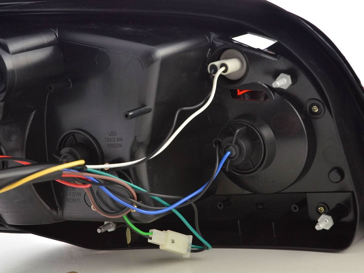 Red and smoke LED tail lights for BMW 5-Series E60 sedan, 2007-2009, by K2 Industries, showing close-up of the taillight design.