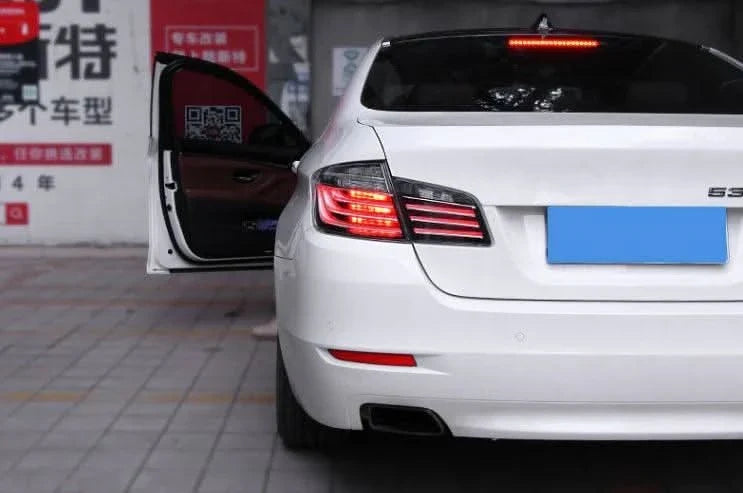 BMW 5-Series F10 clear style LED tail lights by K2 Industries, showing the sleek, modern design for 2010-2017 models.