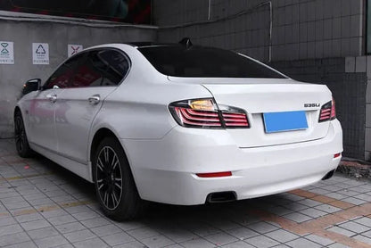 BMW 5-Series F10 clear style LED tail lights by K2 Industries, showing sleek, modern design for model years 2010 to 2017.