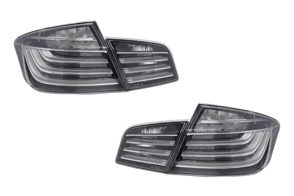 BMW 5-Series F10 clear style LED tail lights by K2 Industries, showing sleek design and bright illumination for model years 2010-2017.