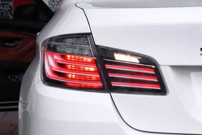 BMW 5-Series F10 clear style LED tail lights by K2 Industries, showing sleek, modern design for 2010-2017 models.