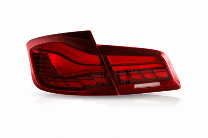 BMW 5-Series F10 F18 M5 GTS style red smoked OLED LED tail lights by K2 Industries, 2011-2017, showing dynamic LED illumination.