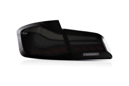 BMW 5-Series F10 F18 M5 GTS style OLED dynamic LED tail lights in red or smoked, designed for 2011-2017 models by K2 Industries.
