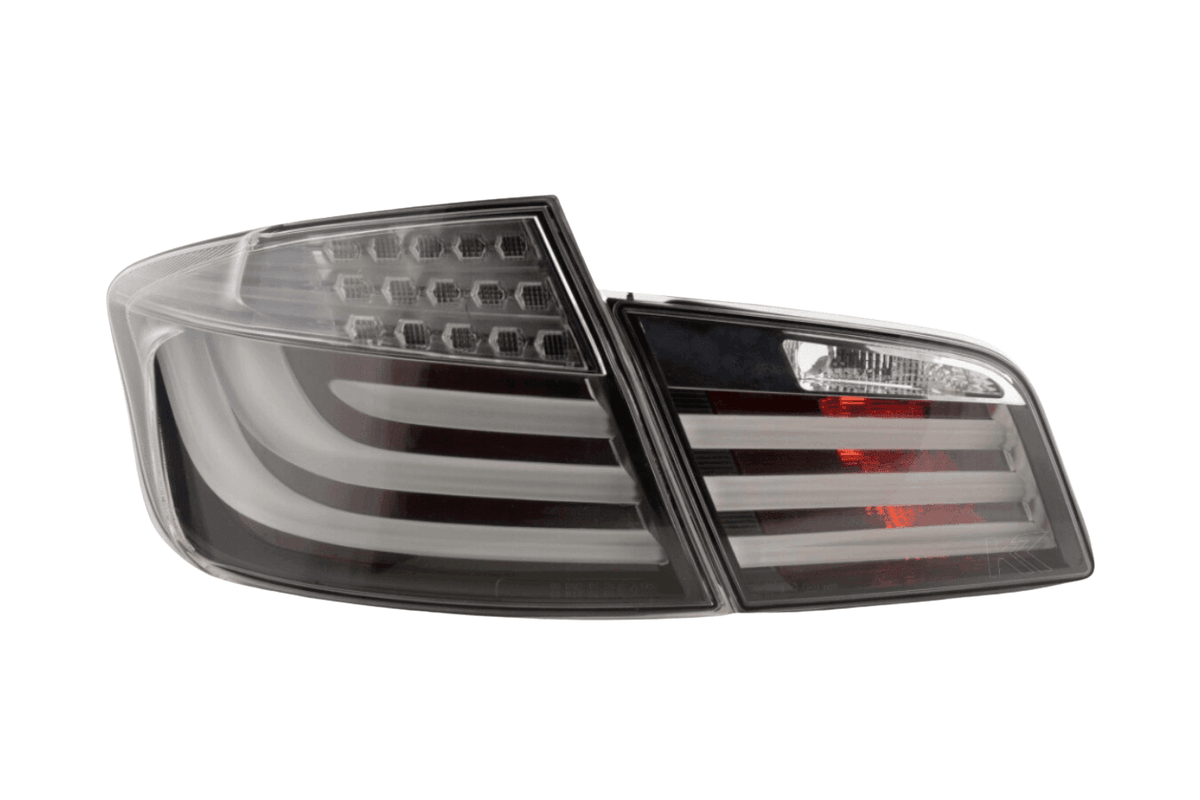 BMW 5-Series F10 sedan black LED tail lights by K2 Industries, designed for 2010-2012 model years.