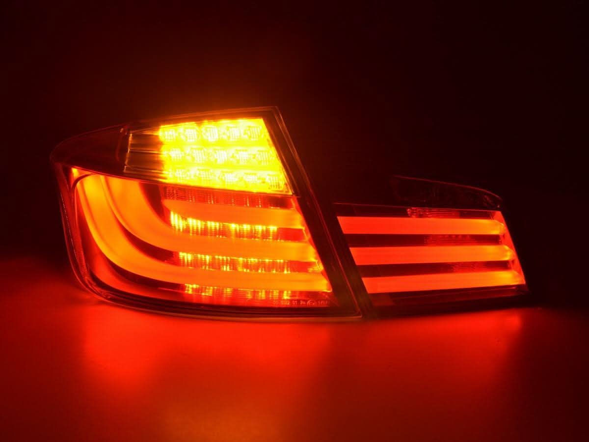 BMW 5-Series F10 sedan black LED taillights by K2 Industries, showcasing sleek tail light design for 2010-2012 models.