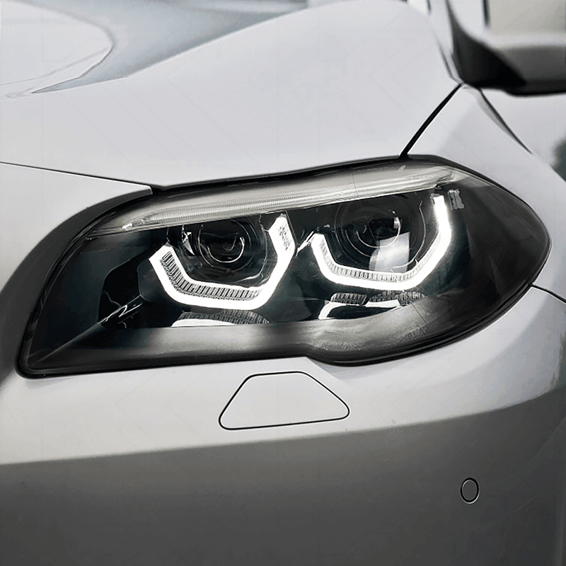 BMW 5-Series F10/F11/F18 3D style headlights by K2 Industries, showing sleek design and clear lens for 2010-2016 models