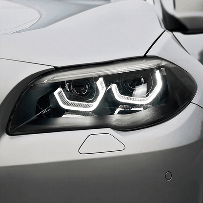 BMW 5-Series F10/F11/F18 3D style headlights by K2 Industries, showing sleek design and clear lens for 2010-2016 models