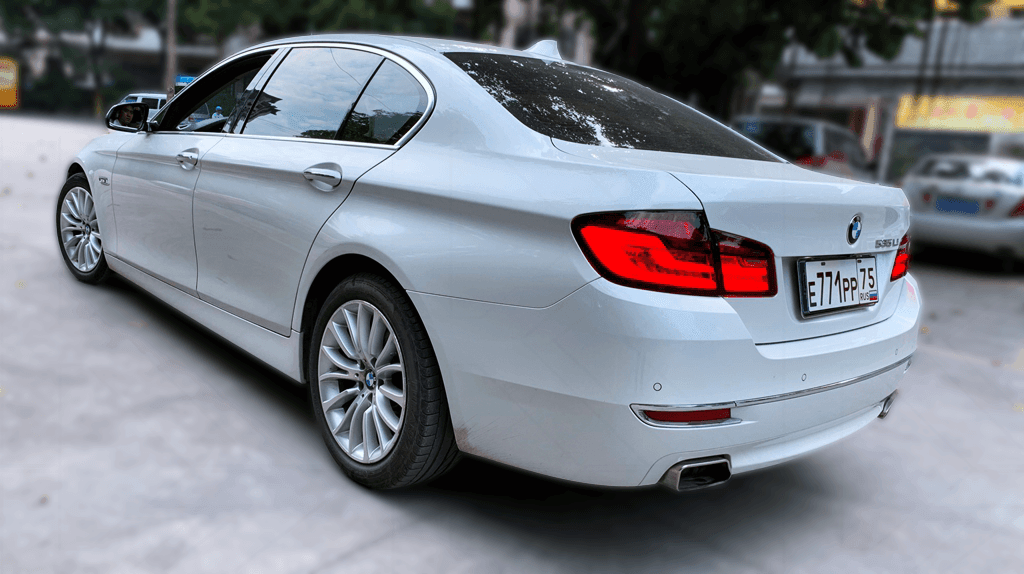 BMW 5-series F10/F18 new generation style tail lights by K2 Industries, designed for 2011-2017 models, shown installed on the vehicle.