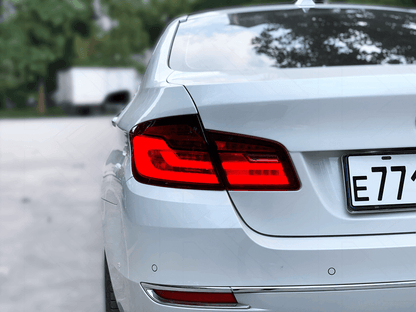 BMW 5-series F10 F18 tail lights by K2 Industries, new gen style, for 2011-2017 model, showing sleek automotive LED tail light design