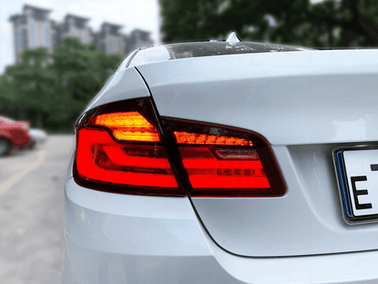 BMW 5-series F10/F18 tail lights by K2 Industries, new generation style for 2011-2017 models, showcasing sleek automotive lighting.