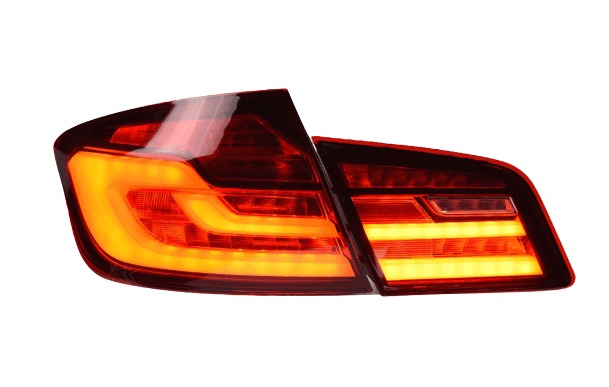 BMW 5-series F10/F18 tail lights by K2 Industries, new generation style for 2011-2017, shown on a vehicle.