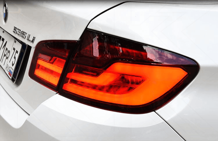 BMW 5-series F10/F18 tail lights by K2 Industries, new generation style for models 2011-2017, showing sleek design and LED accents.