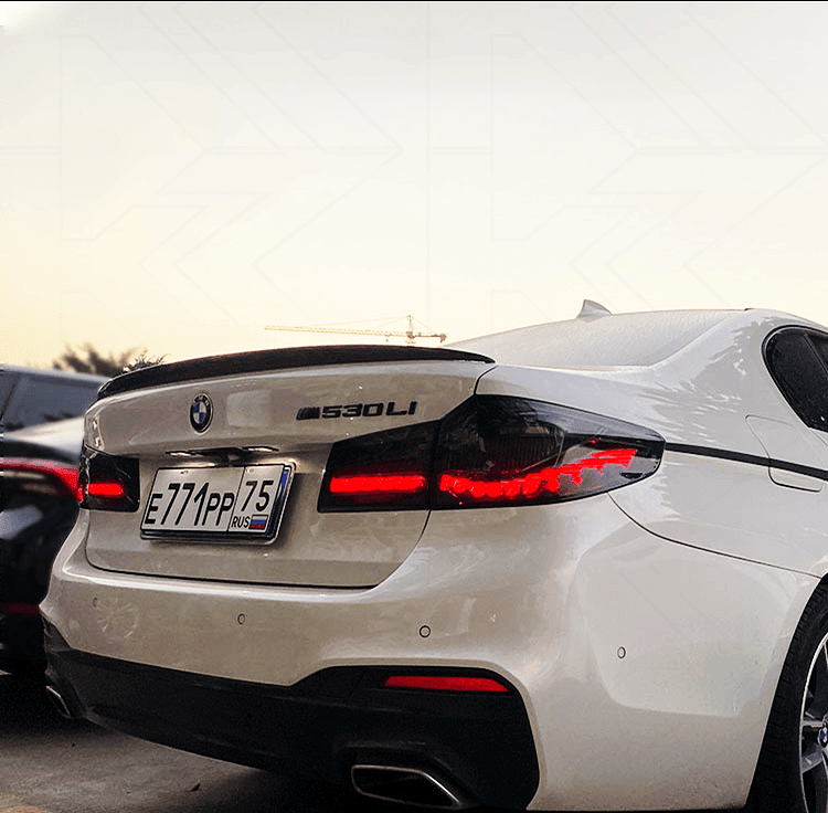 BMW 5-Series G30 G38 M5 tail lights with dragon scale OLED style, dark tinted design, for 2016-2020 models by K2 Industries.