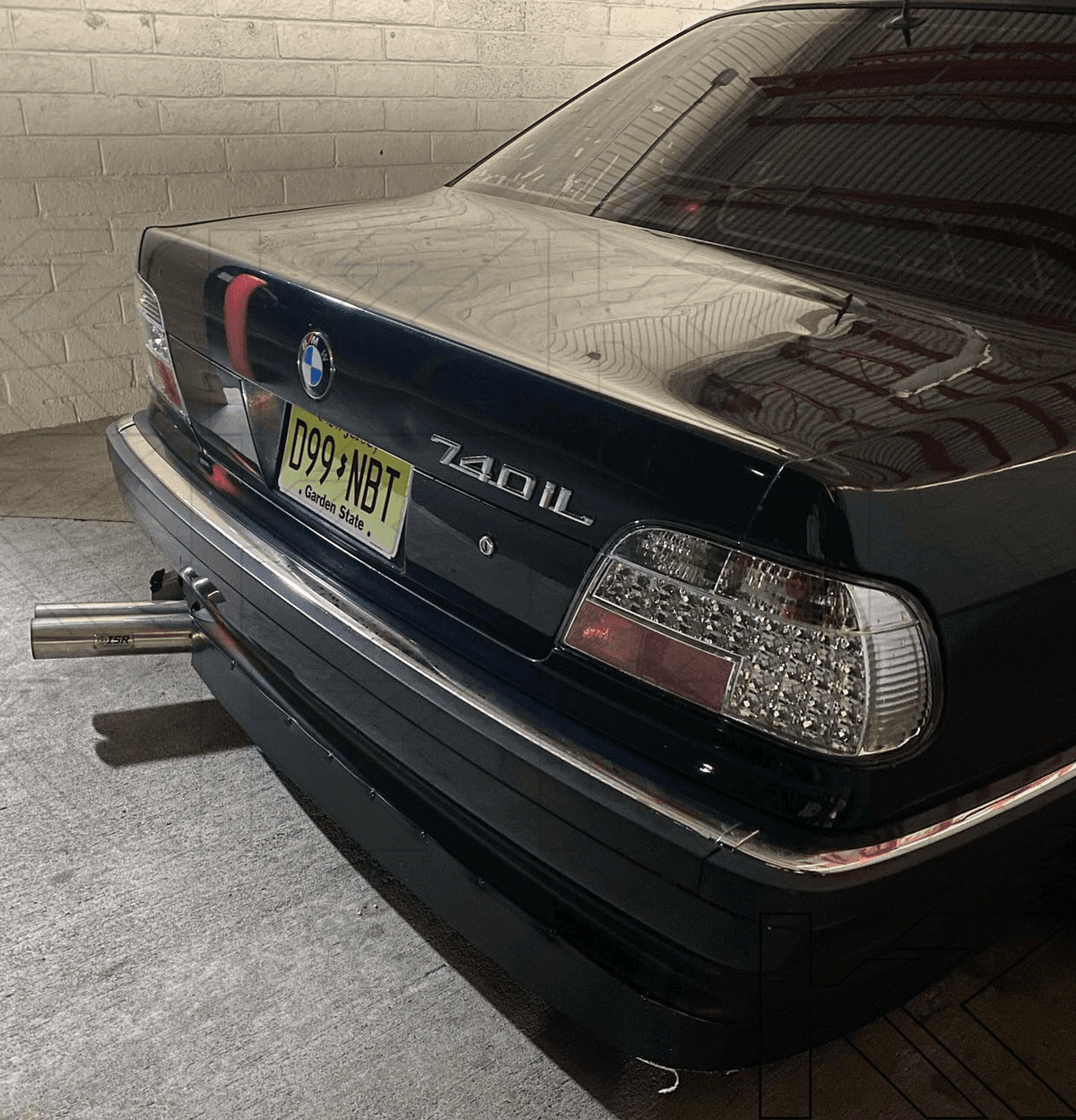 BMW 7-series E38 chrome clear LED taillights set by K2 Industries, shown on a 1995-2002 model with sleek design.