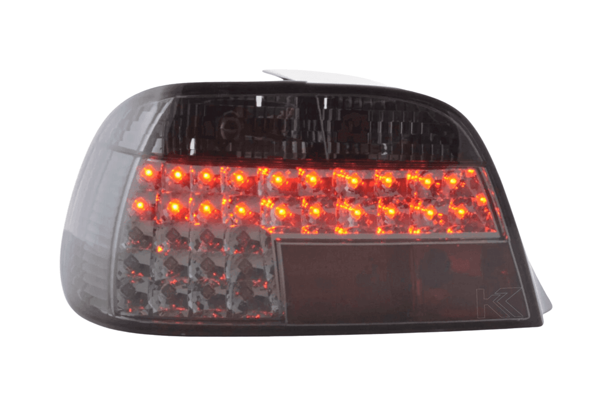 BMW 7-Series E38 clear smoked LED tail lights by K2 Industries, set of two, with integrated brake and turn signal lights.