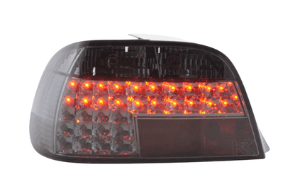 BMW 7-Series E38 clear smoked LED tail lights by K2 Industries, set of two, with integrated brake and turn signal lights.