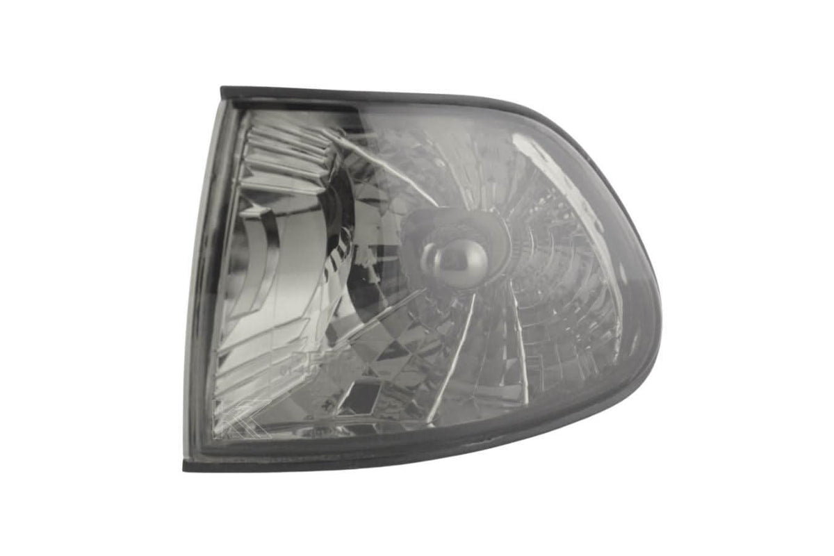 BMW 7-Series E38 smoked corner lights by K2 Industries, 1995-1999, showing the black-tinted, old school design for the vehicle's corners.