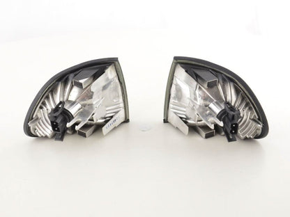 BMW 7-Series E38 smoked corner lights by K2 Industries, 1995-1999, showing close-up of black-tinted vehicle corner lights.