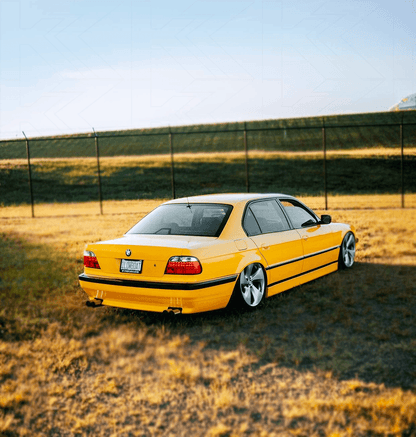 BMW 7-series E38 red LED taillights set by K2 Industries, showing rear view with illuminated red LED tail lights.