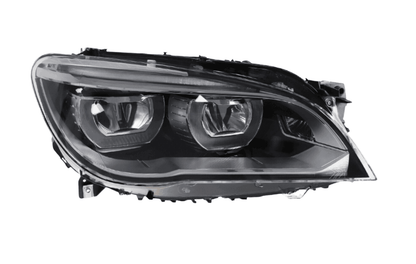 BMW 7 Series F01/F02 headlight upgrade by K2 Industries, 2009-2015, showing sleek automotive headlights with clear lenses.