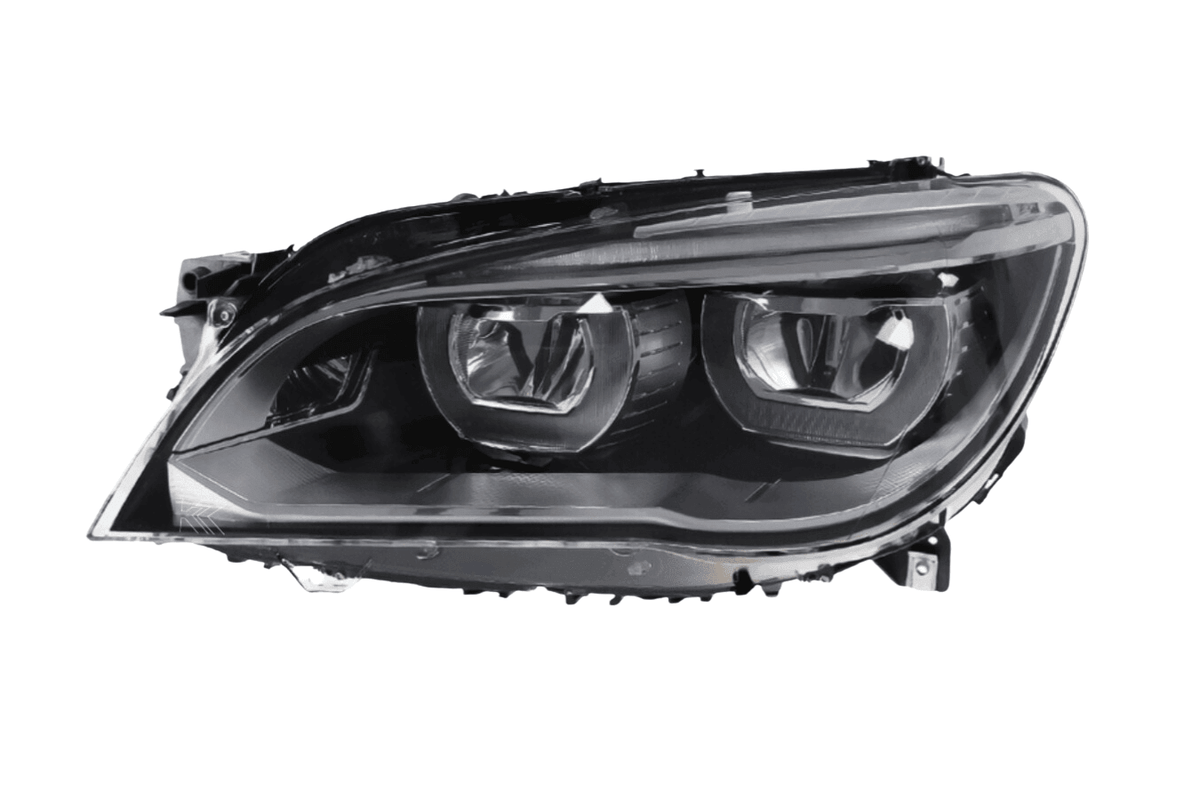 BMW 7 Series F01/F02 headlight upgrade by K2 Industries, showcasing OE headlights with enhanced lighting for 2009-2015 models.