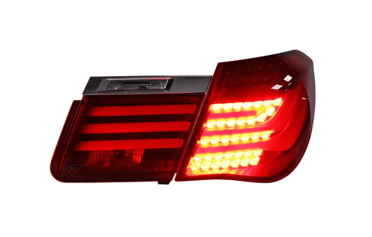 BMW 7-Series F02 red tail lights by K2 Industries, designed for 2009-2015 model with clear lens and LED lighting.