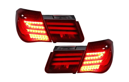 BMW 7-Series F02 red tail lights by K2 Industries, rear view showing red lens and mounting features for 2009-2015 models.