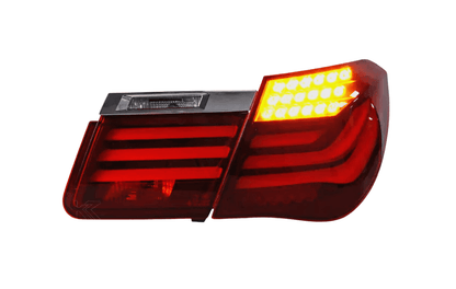 BMW 7-Series F02 red tail lights by K2 Industries, showing the sleek rear lighting design for 2009-2015 models.