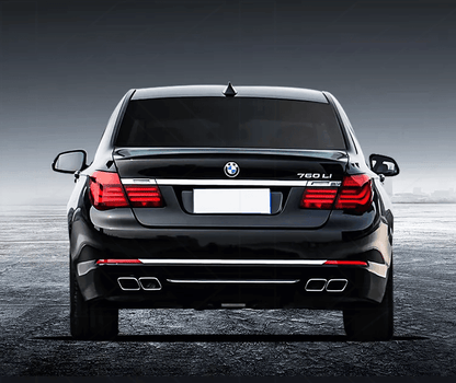 BMW 7-Series F02 red tail lights by K2 Industries, showing the illuminated rear lights on a 2009-2015 model.