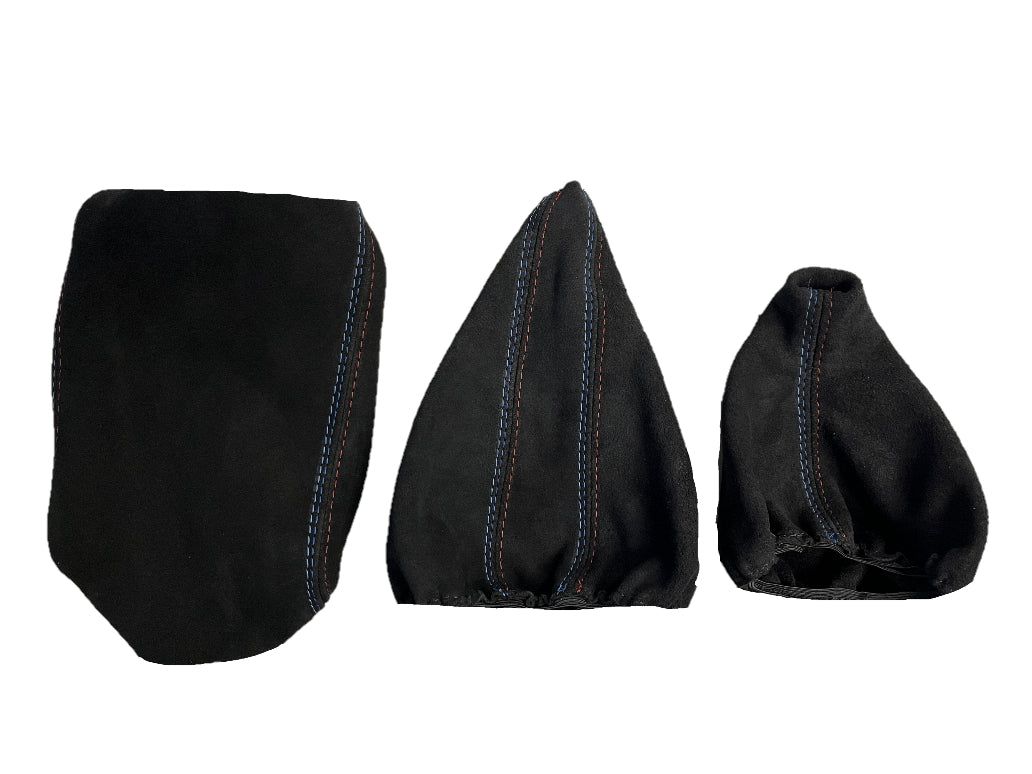 Black genuine suede BMW E36 shift and handbrake console cover with M stitch, designed for 1991-2005 models by JTS Custom Upholstery.