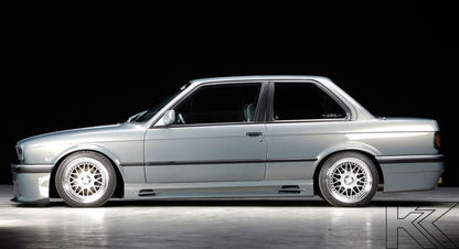 BMW E30 Rieger vented side skirts by K2 Industries, showcasing sleek, aerodynamic design for enhanced car styling.
