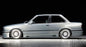 BMW E30 Rieger vented side skirts by K2 Industries, showcasing sleek, aerodynamic design for enhanced car styling.
