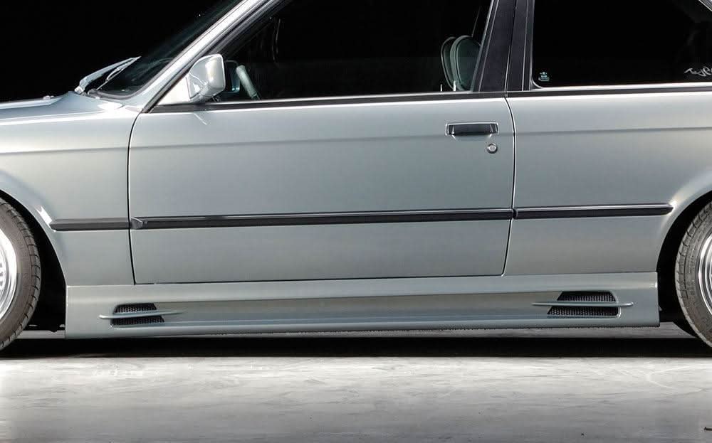 BMW E30 Rieger vented side skirts by K2 Industries, showcasing the sleek, aerodynamic design with vented styling for enhanced performance.
