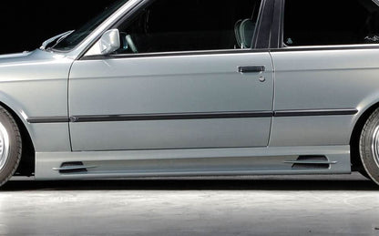 BMW E30 Rieger vented side skirts by K2 Industries, showcasing the sleek, aerodynamic design with vented styling for enhanced performance.