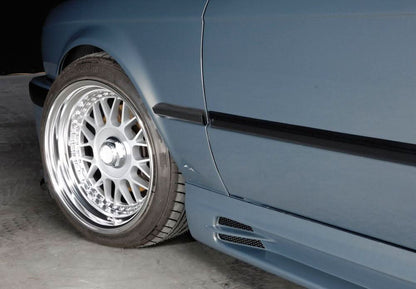 BMW E30 Rieger side skirts Vented Type 1 by K2 Industries showing close-up of vented design and sleek side profile.