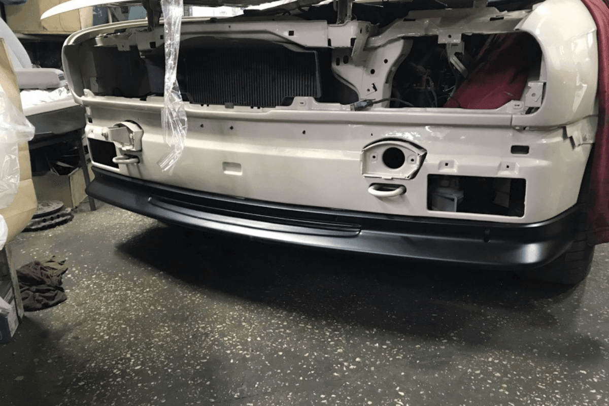 BMW E30 Series 3 Jimmy Hill Style front lip by K2 Industries, designed for 1984-1991 models, visible in this image.