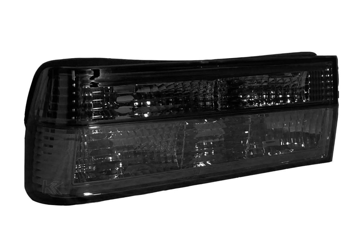 BMW E30 Series 3 pre-facelift clear and smoke LED tail lights by K2 Industries, showing front and side view of the taillights.